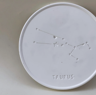 Coaster with constellation on it